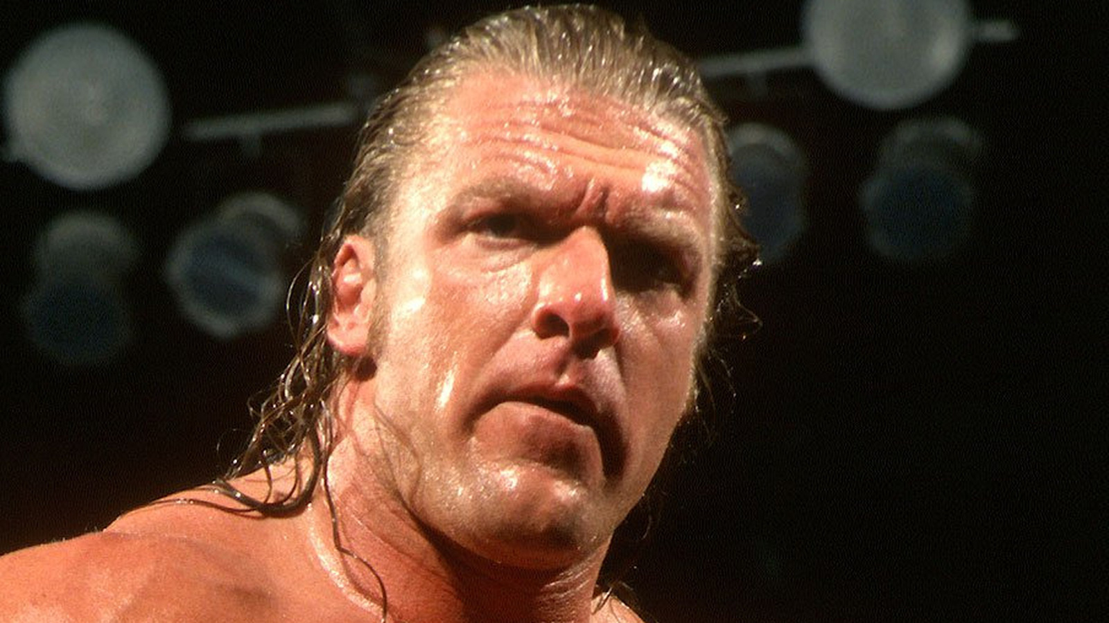 Booker T no mira hacia atrás negativamente a la infame derrota de WWE WrestleMania ante Triple H