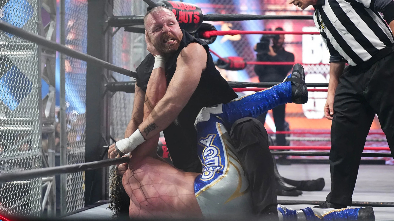 Details On Why Nobody Fell Off AEW Blood & Guts Cage, Who Suggested Bed Of Nails